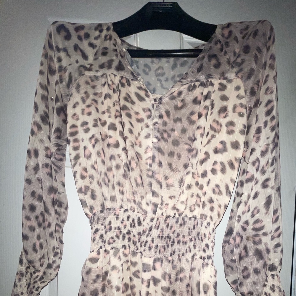 Cheetah patterned ruffled dress.